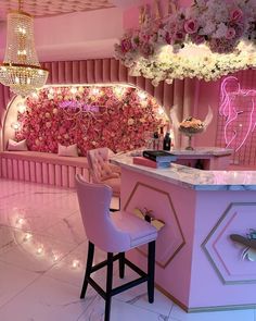 the instagram page shows an image of a pink room with flowers and lights on it