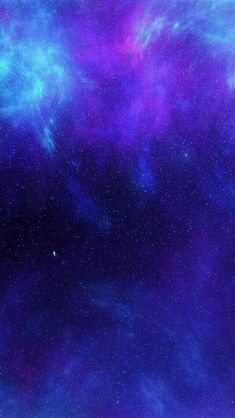 the sky is filled with purple and blue stars as if they were in outer space