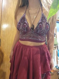 Best fits: - cup size: 32B - 34C - skirt: waist 27 - 35 inches This set includes: halter crop top and fairy skirt. the cups are lined. Handmade by me <3 ready to ship DM for other colors! If you're interested in a different style top or skirt, or want to add sleeves or a bandana let me know! #handmade #fae #festival #fairy #rave Bohemian Triangle Top Halter For Party, Fairy Grunge Fitted Skirt For Festivals, Bohemian Halter Top For Beach Party, Bohemian Halter Top For Party, Fitted Bohemian Halter Top For Party, Bohemian Triangle Crop Top For Party, Fitted Purple Crop Top For Festival, Bohemian Skirt For Night Out, Purple Halter Neck Crop Top