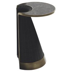 a black and gold side table with a circular metal plate on the top that is shaped like a cone