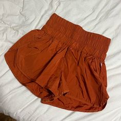 + Brand New Without Tags + Burnt Orange Color + Size Small + Free People Movement Short High Waisted Athletic Short Orange Workout Shorts, Orange Yoga Shorts, Casual Orange Training Shorts, Free People Short, Cheap Orange Athletic Shorts With Built-in Liner, Orange Free People Shorts, Free People Shorts, Burnt Orange Color, Sea Colour