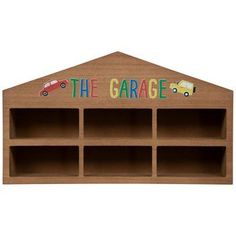 a wooden storage unit with the words the garage painted on it's front and sides