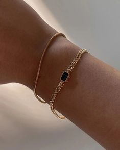 The slinkiest and daintiest bracelet that you can wear every day for that barely-there look. Featuring a 2mm width 18k gold-filled snake chain that can easily be stacked. Tarnish-resistant, showerproof, and safe for sensitive skin. …………………………………. D E T A I L S • Snake chain width measures 2mm• Snake chain length measures 6.5"/16.5cm• Spring clasp• Tarnish-resistant, waterproof, and safe for sensitive skin • 18K Gold Filled Gold Stone Bracelet For Women, Bracelets Gold Simple For Women, Cuban Chain Bracelet, Dainty Gold Bracelet, Gold Chain Bracelet, Snake Chain Bracelets, Classy Jewelry, Seminyak, Jewelry Lookbook