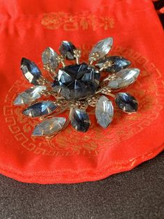 "Rhinestone Pin, rhinestone Jewelry, Blue Dress Brooch, Vintage fashion,Vintage Party Pin,Cocktail Pin,Costume Jewelry, Crystal Diamente Brooch 2\" x 2\". No stones missing. No maker Great vintage condition. Stunning classic design. We refund shipping over $2. Ask about international shipping. Check out: Instagram: https://www.instagram.com/rusticbuckets/ Facebook: https://www.facebook.com/rusticbuckets Pinterest: @rusticbuckets Our sister store Rustic Buckets South for more items: https://www.e Vintage Rhinestone Brooches For Party, Vintage Rhinestone Party Brooches, Vintage Rhinestone Brooches For Evening, Vintage Evening Brooches With Rhinestones, Blue Vintage Brooch For Party, Vintage Crystal Brooches For Formal Occasions, Jeweled Evening Costume Jewelry Brooches, Party Crystal Brooches Costume Jewelry, Elegant Blue Jeweled Brooches