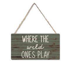 a sign that says where the wild ones play on it, hanging from a rope