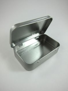 From wedding favors to toy sets, these hinged steel metal tins are perfect for your DIY project needs. PRODUCT DETAILS::: Rectangular "tin" cans with hinged lids made of 100% steel (.24mm) :: Available as a Single tin or in packs of 3 or 10 tins:: Each box measures 3.75" long x 2.25" wide x .75" deep:: Each tin comes assembled with a hinged lid:: All edges are rounded and smooth Tin Box Packaging, Metal Tin Packaging, Mint Tin Crafts, Craft From Waste Material, Cotton Mouth, Secret Box, Mint Tins, Box Hinges, Tin Cans