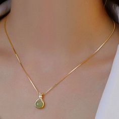 New In Box Gold Light Emerald Stone Necklace I Have Matching Earrings Too For Sale Pear-shaped Green Jewelry For Gifts, Pear-shaped Green Jewelry Gift, Dainty Pear-shaped Jewelry Gift, Emerald Stone Necklace, Stone Gold Necklace, Vase Necklace, Mangal Sutra, Mangalsutra Design, Minimalist Necklace Gold