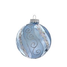 a blue glass ornament with swirls on it