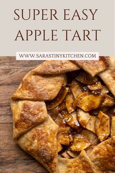 an apple tart on top of a wooden table with text overlay that reads, super easy apple tart