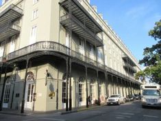 an old building with many balconies on it