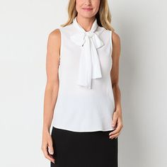 This Black Label by Evan-Picone women's sleeveless blouse offers a sophisticated and stylish look thanks to its chic bow-tie neckline. It's crafted from crepe for a regular-fit. Style it with tailored pants and heels for a polished, professional look.Closure Type: Pullover HeadFit: Regular FitNeckline: Split Tie NeckSleeve Length: SleevelessApparel Length: 23.5 InchesFiber Content: 100% PolyesterFabric Description: CrepeCare: Machine Wash, Line DryMaterial: PolyesterCountry of Origin: Imported Chic Sleeveless Office Tops, Classic Sleeveless Office Tops, Classic Sleeveless Tops For Work, Elegant Sleeveless Tops For Office, Elegant Sleeveless Blouse For Daywear, Classic Sleeveless Blouse For Office, Fitted Sleeveless Blouse For Office, Formal Summer Vest Top, Sleeveless Office Vest Top