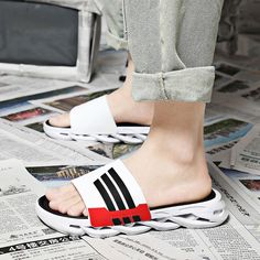 Slide through your day with our comfy - wear as you go - sliders. It's sole made of PVC and rubber gives a perfect mix of durability with softness. State your style with our sophisticated slippers to go along with your vibe! Casual Synthetic Slide Slip-ons, Comfortable Slip-on Slides For Leisure, Casual Cushioned Slip-on Platform Slippers, Casual Outdoor Slip-on Slides, Comfortable Non-slip Slides For Leisure, Casual White Slip-on Flip Flops, Comfortable White Slip-on Slides, Trendy Flat Leisure Slippers, White Non-slip Slip-ons For Summer