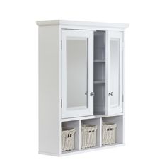 a white cabinet with two doors and three baskets