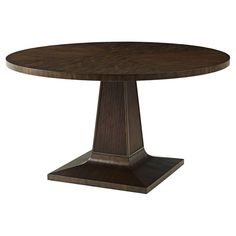 a round wooden table with two pedestals on each side and one end at the base