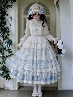 This enchanting piece features a delicate daisy and flower basket print, adding a touch of whimsical charm. The smocked back ensures a comfortable and flattering fit, while the tiered skirt design provides a graceful silhouette. Perfect for tea parties, garden strolls, or any occasion that calls for classic Lolita sophistication. SizeSMLFull Length117-120120-123123-126Bust78-9083-9588-100Waist62-7467-7972-84Hem Circumference330340350 White Dress With Floral Embroidery And Tiered Skirt, White Tiered Dress With Floral Embroidery, Tiered Lace Trim Dress For Garden Party, Cottagecore Tiered Skirt Dress For Garden Party, Cottagecore Dresses With Ruffles And Tiered Skirt, Cute Cotton Dress With Tiered Skirt, Cute Cotton Tiered Dress, Cottagecore Tiered Dress With Ruffles, Cottagecore Tiered Skirt Dress With Ruffles