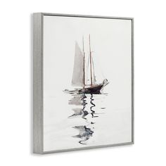 a sailboat floating in the water on a foggy day canvas wall art print