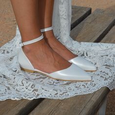 "❤The shoes of your dreams will be handmade for you, by our skilled artisans, using the finest materials and exquisite craftsmanship❤ ''NO PLAIN JANE''.   A pair of elegant and comfortable ballet flats, made by the finest pearly leather. All of the embellishments are handsewn onto the sandals. Choose White or Ivory color.  ❤Handmade to order in WHITE or IVORY leather color.  ❤Heel Height: 1cm /0.39\" ❤Run true to size/Medium Width. NOT suitable for Wider width. ❤Premium Genuine Greek leather ❤An Elegant Closed Toe Flats For Ceremony, Elegant Pointed Toe Flats With Ankle Strap For Wedding, White Court Shoes With Removable Insole And Flat Heel, White Low Heel Ballet Flats For Party, Elegant Pointed Toe Ballet Flats For Wedding, Low Heel Wedding Flats For Spring, Elegant Wedding Pointed Toe Flats With Ankle Strap, Spring Wedding Ballet Flats With Ankle Strap, White Pointed Toe Flats For Party