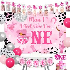 a pink and black themed birthday party with balloons, decorations, and pictures on the wall