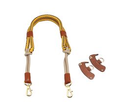 a yellow and brown leash with two hooks