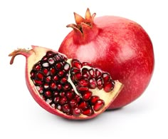 the pomegranate is cut in half and ready to be used as a garnish