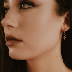 Step up your style with our Mercy Gold Spike Hoop Earrings! Crafted from stainless steel and plated in 18k gold, these small but mighty hoops are the perfect accessory for a look that’s fashion-forward and edgy. With a faithful spike detail, you’ll add a dash of boldness to your style and make a serious statement that’ll stand out. Get ready to pierce the fashion scene with Mercy! Spike Hoop Earrings, Small But Mighty, Bags Logo, Gothic Jewelry, Steel Jewelry, Stainless Steel Jewelry, Step Up, The Fashion, Fashion Forward