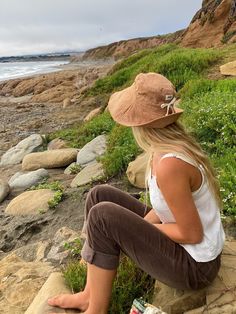 "A wide brim sun hat for beach days and summer fun. This sun hat for women has a nice wide brim to protect your whole face and even your neck and chest. A drawstring around the head keeps the hat fitting snug. Easy to bring along in your bag, folds up easy. This hat is made from a medium weight homespun linen and cotton blend fabric in a rust color. Inside liner is white cotton. I used a stiff interfacing for brim to keep it's shape. A sun hat for beach days and summer fun. This sun hat for wome Casual Bucket Hat For Travel And Beach Season, Casual Bucket Hat For Beach Season Travel, Casual Bucket Hat For Beach Travel, Coastal Travel Sun Hat, Casual Wide Brim Bucket Hat With Upf 50+, Casual Wide Brim Bucket Hat Upf 50+, Coastal Style Travel Sun Hat, Summer Bucket Hat For The Beach In Brown, Brown Summer Bucket Hat For Beach