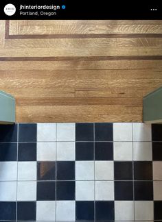 a black and white checkered floor in a kitchen