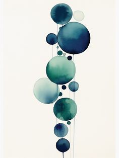 an abstract painting with blue and green circles hanging from it's sides on a white background