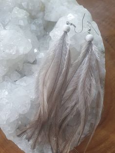 Emu feather earrings and white bead. Feather Necklaces, Emu, Feather Earrings, White Beads, Jewelry Earrings Dangle, Etsy Earrings, Dangle Drop Earrings, Dangle Earrings, Handmade Items