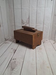 This retro shoe shine box opens to a compartment for shoe polish, cloth, and brush storage. This item is vintage and shows some signs of age.  The kit has one large interior compartment to hold brushes and shoe shine accessories and a shoe rest carry handle to readily move the box from storage to use. The interior of the box is dusty and dirty. Wood Shoe Shine Box, Mcm Shoes, Shoe Shine Box, Lexington Nc, Accessory Storage, Brush Storage, Vintage Shoe, Shoe Polish, Shoe Shine