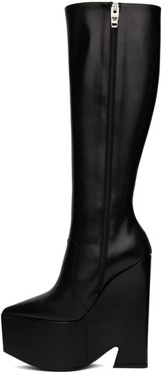 Versace.Black Tempest Platform Tall Boots.Knee-high buffed calfskin boots in black..· Pointed toe.· Zip closure at inner side.· Buffed leather lining.· Covered platform midsole.· Covered heel with rubber injection.· Medusa hardware at polished calfskin outsole.· Platform: H3 in.· Heel: H6 in.Supplier color: Black/Palladium.Calfskin..Made in Italy..231404F115004 Formal Mid-calf Boots With Wide Calf And Leather Lining, Black Heeled Boots With Wide Calf And High Shaft, Black Knee-high Heeled Boots For Business, Knee-high Black Heeled Boots For Business, Black Almond Toe Knee-high Boots For Business, Black Leather-lined Knee-high Boots For Business, Black Wide Calf Business Boots, Black Wide Calf Boots For Business, Formal Leather High Shaft Heeled Boots