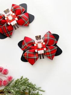 Holiday Hair Bows Christmas Nutcracker Soldier Hair Bow. Perfect for any holiday party or pictures!This Bow measures approximately 4" long and can be attached to any option available.Also, on all prong clips, we will add a no-slip grip.Some pieces may contain small parts. Do not leave children unattended while wearing accessories.Are you following us on Instagram? #JentaBows Nutcracker Hair Bow, Hair Accesorios, Christmas Hairbow, Holiday Hair Bows, Bows Christmas, Nutcracker Soldier, Holiday Hair, Christmas Hair Bows, Christmas Hair