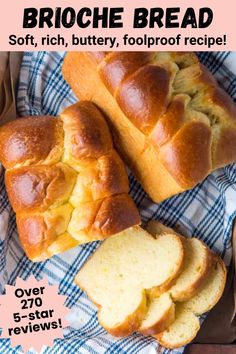 two loaves of bread sitting on top of a blue and white checkered towel