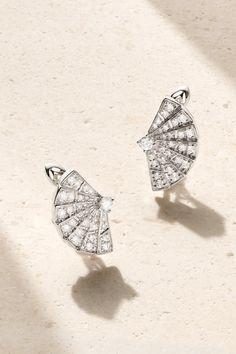 Garrard's 'Fanfare Symphony' earrings celebrate the opulence and elegance of theater in the 18th century. Hand-cast from 18-karat white gold, they're set with sparkling white diamonds in delicate segments. Wear yours with the coordinating necklace. Luxury Platinum Diamond Earrings Hallmarked, Luxury Diamond White Earrings With Elegant Design, Luxury Hallmarked Diamond Earrings For Formal Occasions, Elegant Platinum Earrings, Elegant Platinum Earrings For Evening, Elegant Evening Platinum Earrings, Luxury Platinum Diamond Earrings For Evening, Luxury Bridal Earrings With Brilliant Cut, Luxury Platinum Earrings For Evening