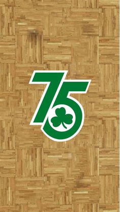 an image of the number 75 with shamrocks on it's backgrund