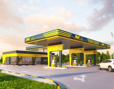 a yellow and black gas station with cars parked at it