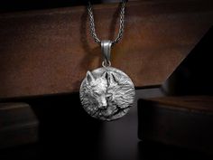 Wolf family with moon pendant neckalce for men or women, Good family pendant, Animal lover gift, Moon silver pendant, Charming wolf necklace Wolf Symbolism and meaning is steeped in mystery and power. From ancient times, people have both feared and been fascinated by the majestic Wolf. Wolf also symbolizes loyalty, family and friendship, protection, wildness and other noble traits. Made from "925" Hallmarked authentic Sterling Silver. This wolf pendant features exclusive handmade engraving detai Wolf Symbolism, Family Pendant, Wolf Family, Majestic Wolf, Good Family, Wolves Pendants, Wolf Necklace, Moon Pendant Necklace, Polish Silver