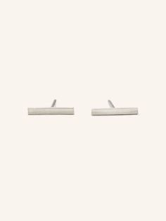 A stunning everyday essential. The Flat Bar Stud earrings are your minimal jewelry best friend. You can pair this with your other pieces or wear it alone to make it simple. Bar Stud Earrings, Bar Studs, Solid Gold Earrings, Minimal Jewelry, Gold Studs, Gold Earrings Studs, Everyday Essentials Products