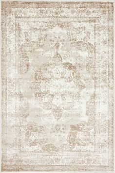 a beige rug with an ornate design on the top and bottom, in shades of light brown