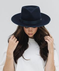 Our Monroe Rancher felt fedora hat is a bestseller for good reason, this quintessential wool fedora hat stands the test of time making it the perfect staple in any wardrobe. The Monroe Rancher is a hat with a teardrop shaped crown, stiff upturned brim, and is paired with a tonal grosgrain band. These beautiful combinations make this felt fedora hat a classic. Wool Fedora Hat, Crown Heights, Wool Fedora, Felt Fedora, Hat Stands, Halo Style, Find Color, Wearing A Hat, Felt Hat