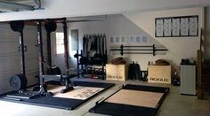 the inside of a home gym with various equipment