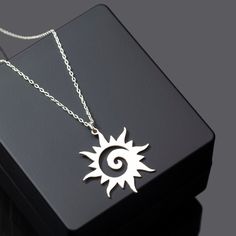 "Spiral Sun Jewelry, Sunburst Necklace in Sterling Silver is made by hand in our workshop with care. All our jewelry is the most elegant choice for the Bridesmaids, friends, your loved ones and for yourself. Spiral Sun Jewelry, Sunburst Necklace in Sterling Silver * Material: High Quality Solid 925 Sterling Silver. * Finish: Sterling Silver ∙ 18K Gold ∙ Rose Gold. * All our jewelry is custom made by hand with care in our workshop.  HOW TO ORDER ❓ * Select your necklace COLOR. * Choose necklace l Symbolic Sun Design Jewelry For Gifts, Silver Sun Design Jewelry As A Gift, Silver Necklace With Sun Design As A Gift, Silver Sun Design Necklace For Gift, Silver Necklace With Sun Design For Gift, Celtic Sun, Spiral Sun, Eternity Symbol, Sunburst Necklace