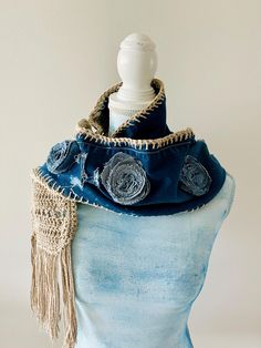 Welcome to LM Handmade Boutique! Upcycled Denim Flower Scarf   Step into a world where fashion meets craftsmanship. Lovingly handmade, blending crochet and upcycled denim to create a truly one-of-a-kind piece.  No two are alike! Unique Design: Crafted with a unique pattern and texture, ensuring that you stand out in any crowd. Eco-Friendly: Our upcycled denim adds a sustainable touch, helping you stay stylish and environmentally conscious. Handmade Quality: Every stitch is made with care and pre Denim Scarf, Hippie Scarf, Funky Scarves, Bohemian Scarf, Wearable Art Fashion, Bohemian Scarves, Boho Scarf, Easy Diy Christmas Gifts, Blue Jeans Crafts