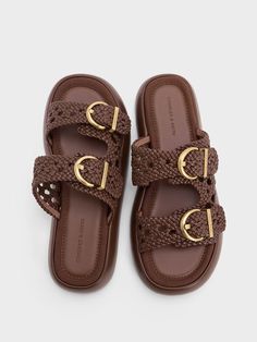 Comfort is given an elevated aesthetic with these sandals. Woven straps imbue the dark brown finish with a subtle tactility, while gold-toned buckles add polish. These details elevate the classic slip-on style, offering a breathable silhouette that can still be dressed up for more formal occasions. Set on flat padded soles, you will want to wear these all day, every day. Charles And Keith Shoes, Charles Keith, Buckle Sandals, Brown Sandals, Slide Sandals, Dark Brown, Shoes Sandals, Jewelry Accessories, Shoe Bag