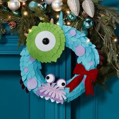 a wreath decorated with googly eyes and an octopus