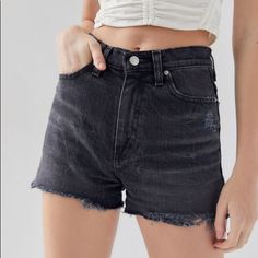 Exclusive High-Rise Denim Short-Short In Our Signature Girlfriend Fit By Bdg From Uo. In Soft Stretch Denim With A Relaxed-Slim Fit Built With 5 Pockets + Zipper Fly. Complete With A Raw-Edge, Frayed Hem. Smoke Free Pet Friendly. New With Tags. - 99% Cotton, 1% Spandex - Machine Wash - Model Is 5’9” And Wearing Size 26 Grunge Jean Shorts With Built-in Shorts, Grunge High Waist Jean Shorts With Built-in Shorts, Fitted Washed Black Cutoff Bottoms, Casual Fitted Cutoff Shorts, Black Relaxed Fit Shorts With Frayed Hem, Relaxed Fit Black Shorts With Frayed Hem, Washed Black Cutoff Shorts, Grunge High Rise Shorts With Pockets, Edgy Relaxed Fit Cotton Shorts