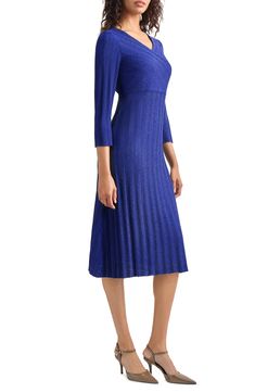 Step out in this sweater-dress decorated in textural stripes and designed in a timeless A-line silhouette that's perfect for any occasion. Surplice V-neck Three-quarter sleeves 56% acrylic, 33% nylon, 11% polyester Machine wash, dry flat Imported Chic A-line Ribbed Dress, Chic Ribbed A-line Dress, Elegant Ribbed Evening Dress, Spring Formal Ribbed Dress, Elegant Formal Spring Sweater Dress, Elegant Formal Sweater Dress For Spring, Ribbed Formal Dress For Spring, Fitted Textured Knit V-neck Dresses, Fitted Textured Knit Dress With V-neck