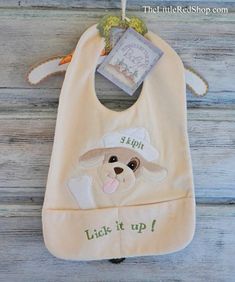 Bunnies by the Bay Skipit Dog Baby Bib Baby Bib Hanger, Children's Book Characters, Baby Dishes, Baby Cleaning Products, Bun Bun, Baby Boy Accessories, Pacifier Holder, Board Book