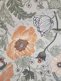 an orange and white flower pattern on a wallpaper background with leaves, flowers, and buds