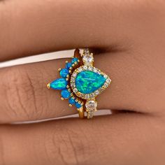 Blue Opal Engagement Ring, Wedding Rings Opal, Pear Opal Ring, Wedding Ring Opal, Fantasy Wedding Rings, Opal Wedding Ring Set, Black Opal Engagement Ring, Opal And Sapphire Ring, Opal Engagement Ring Set